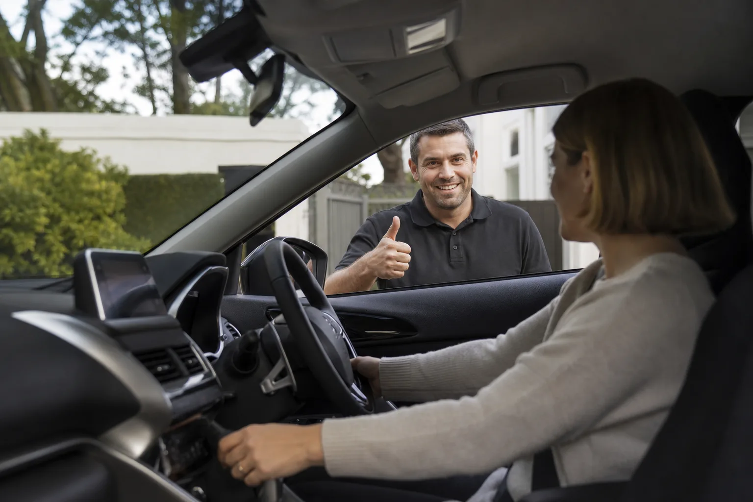 Customer testing a right-hand-drive car after mobile ignition service